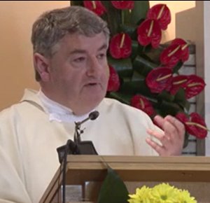 Irish Priest Giving the Homily